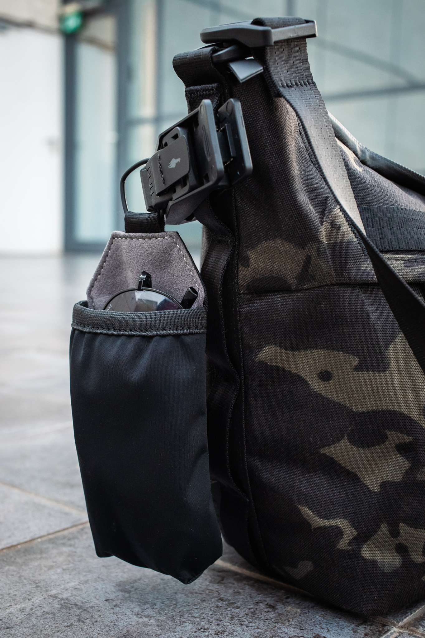 HUB Sunglasses Pouch clipped to the side of the Flow Satchel